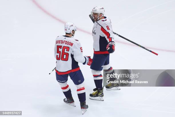 Alex Ovechkin of the Washington Capitals celebrates after scoring a goal against the Chicago Blackhawks, the 798th career goal, during the first...