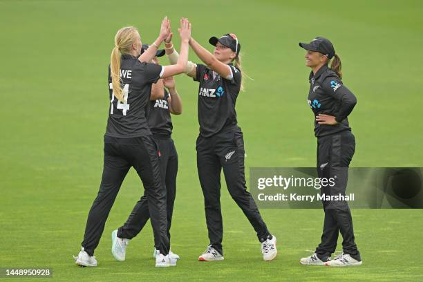 New Zealand players celebrate during game two of the One Day International series between New Zealand and Bangladesh at McLean Park on December 14,...