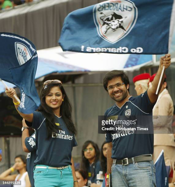 Oriya actor and Deccan Chargers brand ambassador Sabyasachi Mishra and former Indian Idol Archita cheering for Deccan Chargers in IPL 5 match against...