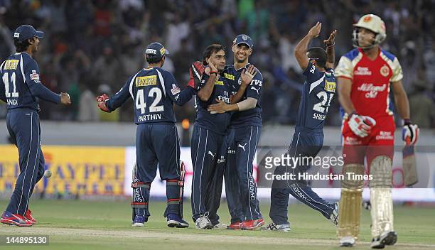 Deccan Chargers bowler Amit Mishra celebrates after the dismissal of Deccan Chargers batsman Mayank Agarwal in IPL 5 T20 match played between Deccan...