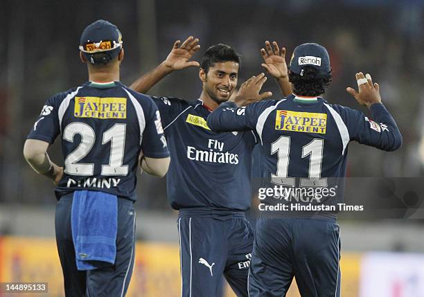 Deccan Chargers players Veer Pratap Singh, Captain Kumar Sangakkara & JP Duminy celebrate after their victory in IPL 5 T20 match played between...