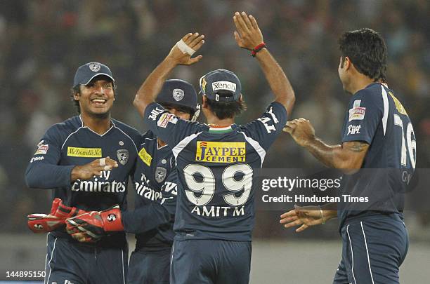 Deccan Chargers Captain Kumar Sangakkara & other players celebrate after their victory in IPL 5 T20 match played between Deccan Chargers and Royal...