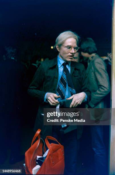 Andy Warhol attends a party celebrating Yves St. Laurent at "21" in New York City on November 13, 1972.