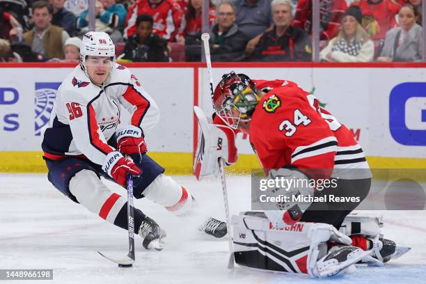 Nicolas Aube-Kubel of the Washington Capitals takes a shot on goal against Petr Mrazek of the Chicago Blackhawks during the third period at United...