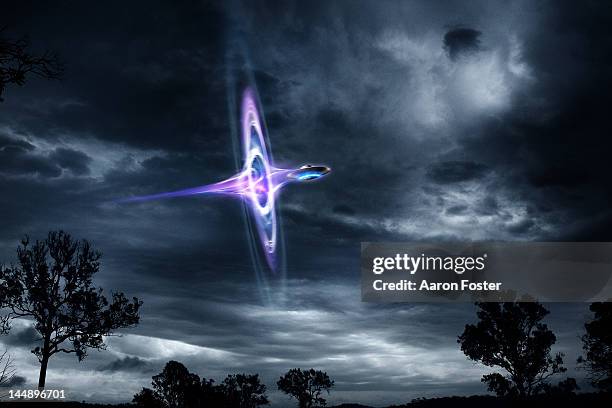 ufo time travel worm hole - spaceship stock pictures, royalty-free photos & images