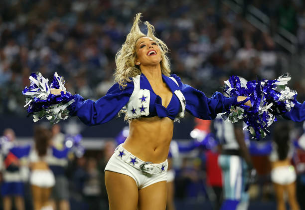 Dallas Cowboys Cheerleader performs during a game against the Indianapolis Colts at AT&T Stadium on December 04, 2022 in Arlington, Texas.