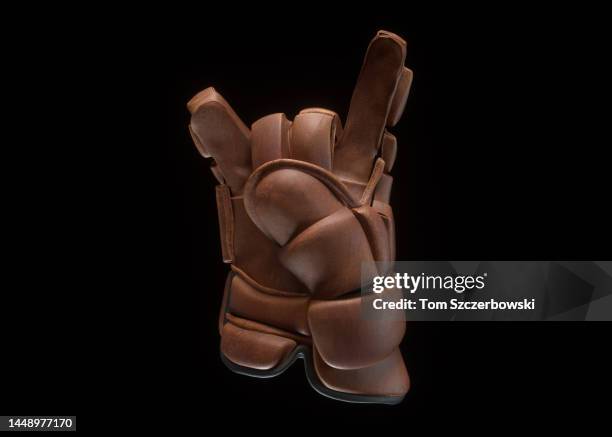 hockey glove devil horns sign - london - ontario stock pictures, royalty-free photos & images