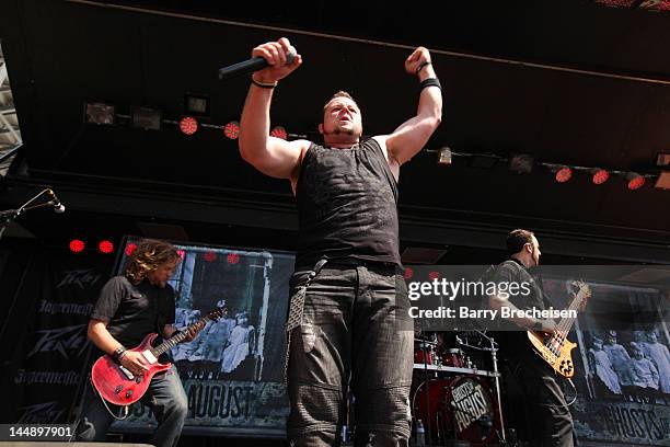 Musicians Steven Lee, Dave Holowchak and Terry Freers of Ghosts of August perform during the 2012 Rock On The Range festival at Crew Stadium on May...