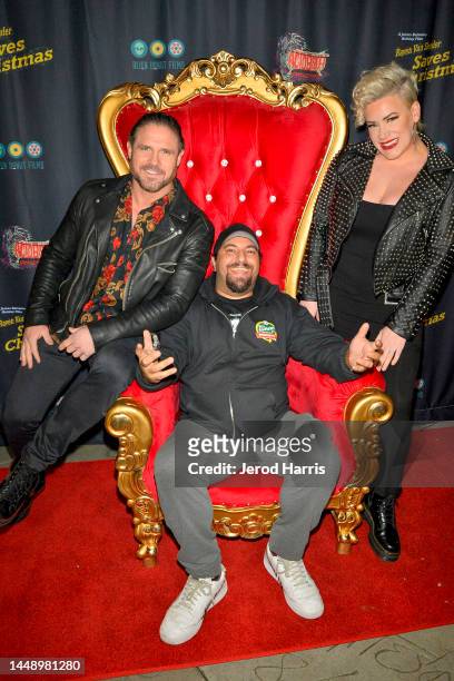 John Hennigan, James Balsamo and Taya Valkyrie attend Raven Van Slender Saves Christmas! Premiere at TCL Chinese Theatre on December 13, 2022 in...
