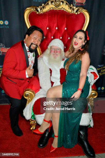 Bill Victor Arucan and Shari Davis attend Raven Van Slender Saves Christmas! Premiere at TCL Chinese Theatre on December 13, 2022 in Hollywood,...