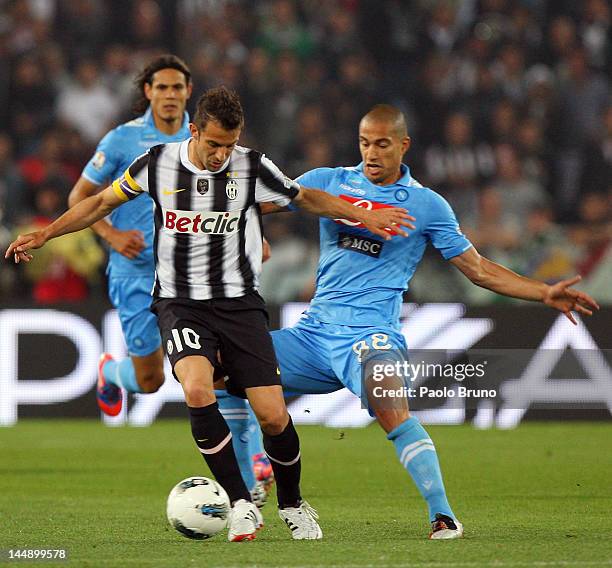 Alessandro Del Piero of Juventus FC competes for the ball with Gokhan Inler of SSC Napoli during the Tim Cup final match between Juventus FC and SSC...