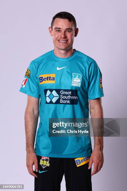 Sam Heazlett poses during the Brisbane Heat Big Bash League headshots session on November 14, 2022 in Brisbane, Australia.