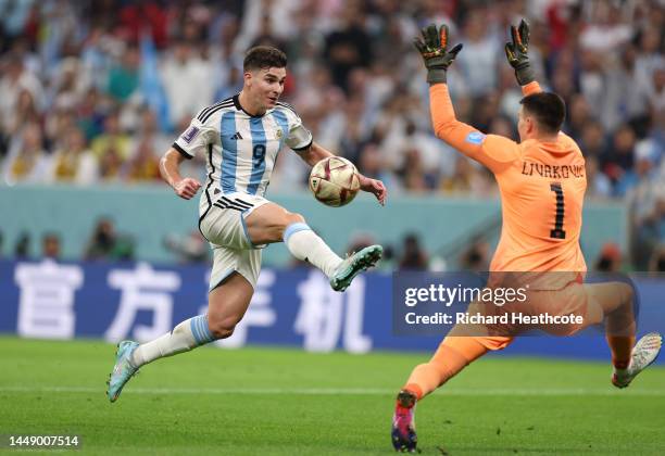 Julian Alvarez of Argentina is brought down by Dominik Livakovic of Croatia and a penalty is awarded during the FIFA World Cup Qatar 2022 semi final...