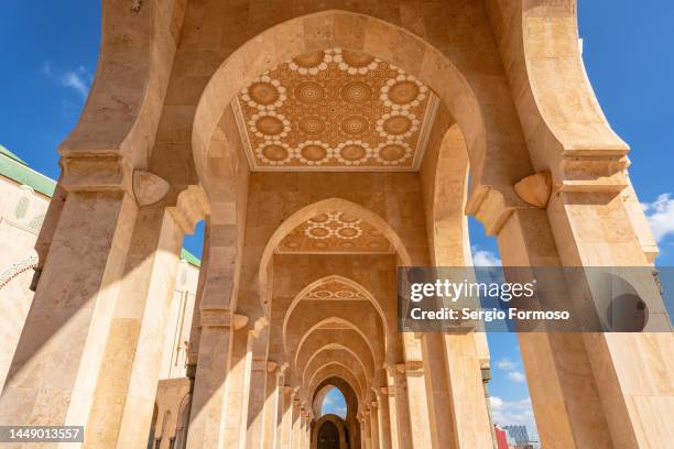 symmetric corridor with arab style arches - ムーア様式 ストックフォトと画像