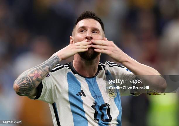 Lionel Messi celebrates after their sides third goal by Julian Alvarez of Argentina during the FIFA World Cup Qatar 2022 semi final match between...