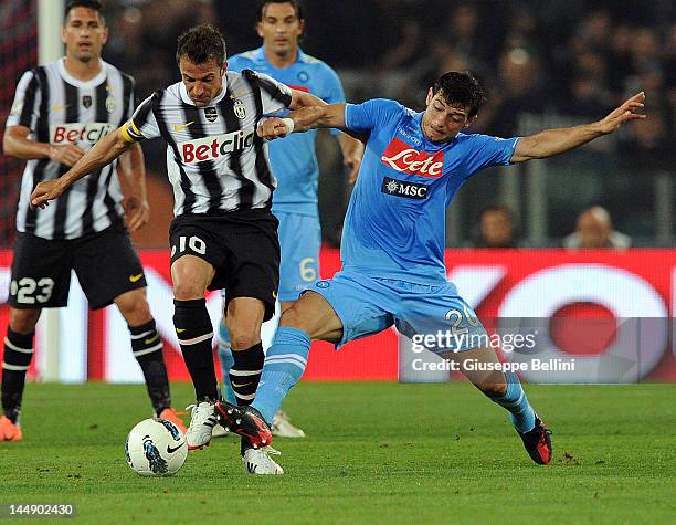 Alessandro Del Piero of Juventus and Blerim Dzemaili of Napoli in action during the Tim Cup final match between Juventus FC and SSC Napoli at...