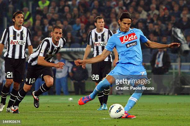Edinson Cavani of SSC Napoli scores the opening goal by the penalty during the Tim Cup final match between Juventus FC and SSC Napoli at Olimpico...