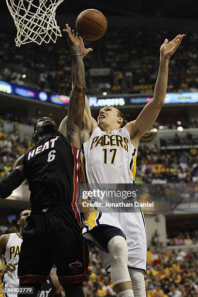 LeBron James of the Miami Heat blocks a shot by Lou Amundson of the Indiana Pacers in Game Four of the Eastern Conference Semifinals in the 2012 NBA...