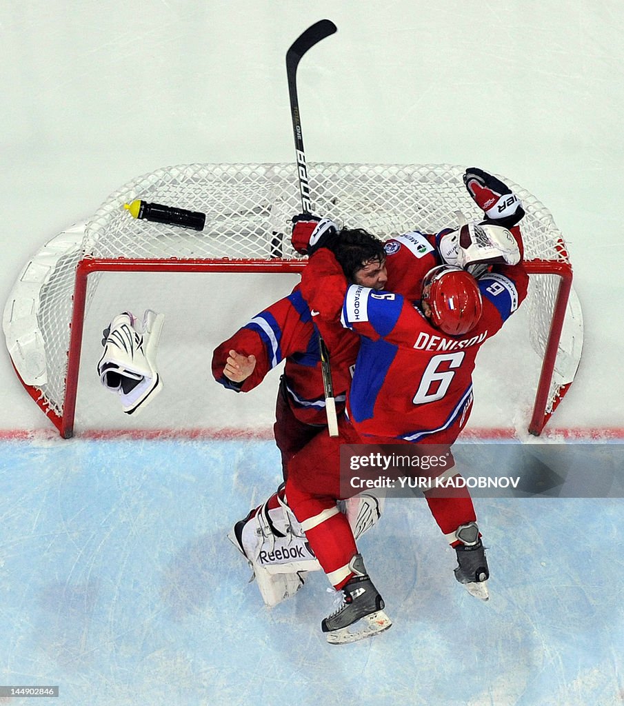 Russia's goalkeeper Semyon Varlamov (top