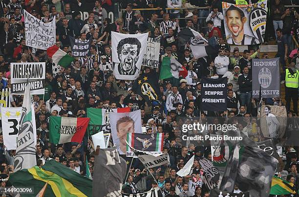 Fans of Juventus FC team support their team during the Tim Cup final match between Juventus FC and SSC Napoli at Olimpico Stadium on May 20, 2012 in...