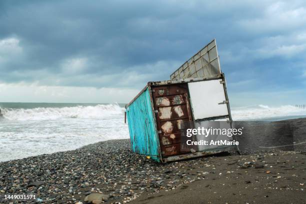 damaged container after storm - coastal deprivation stock pictures, royalty-free photos & images