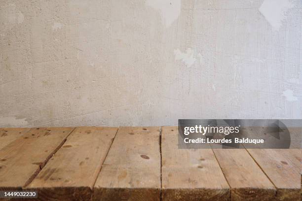 wooden table and wall background - weathered plank stock pictures, royalty-free photos & images