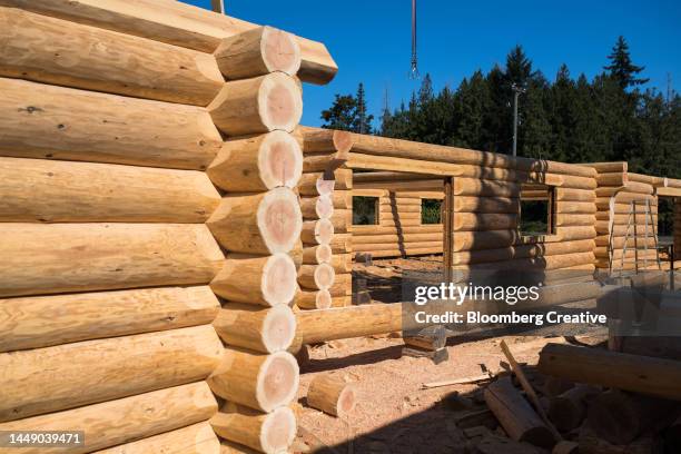 log cabins under construction - incomplete stock pictures, royalty-free photos & images