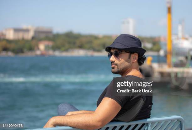 young tourist man is traveling to istanbul. - iraaks stockfoto's en -beelden