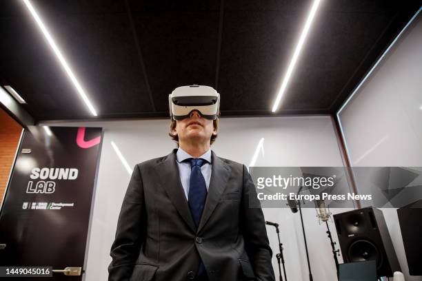 The mayor of Madrid, Jose Luis Martinez-Almeida, tries on virtual reality glasses during the inauguration of the Madrid in Game Video Game Campus, on...