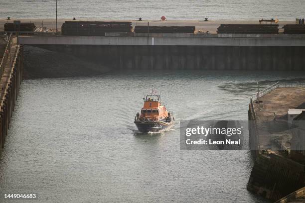 An RNLI life boat arrives back in port after taking part in a rescue mission in the English Channel on December 14, 2022 in Dover, England. A major...
