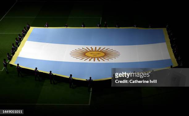Giant Argentina national flag is displayed prior to the FIFA World Cup Qatar 2022 semi final match between Argentina and Croatia at Lusail Stadium on...