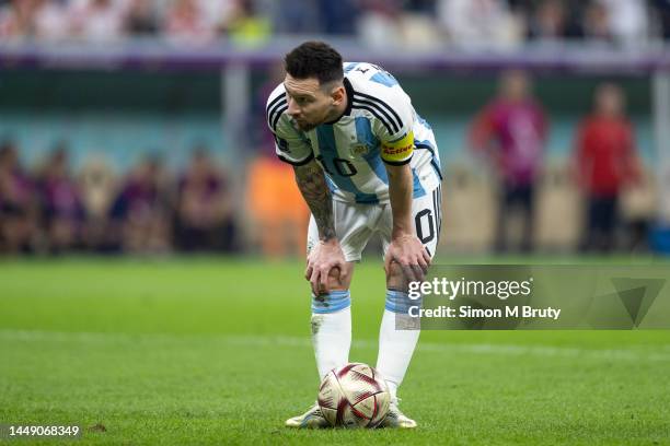 Lionel Messi of Argentina prepares to take a penalty during the FIFA World Cup Qatar 2022 semi final match between Argentina and Croatia at Lusail...