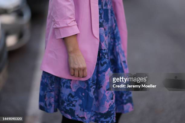 Anna Wolfers seen wearing an oversized blue and pink patterned flower dress and a light pink blazer on December 09, 2022 in Hamburg, Germany.