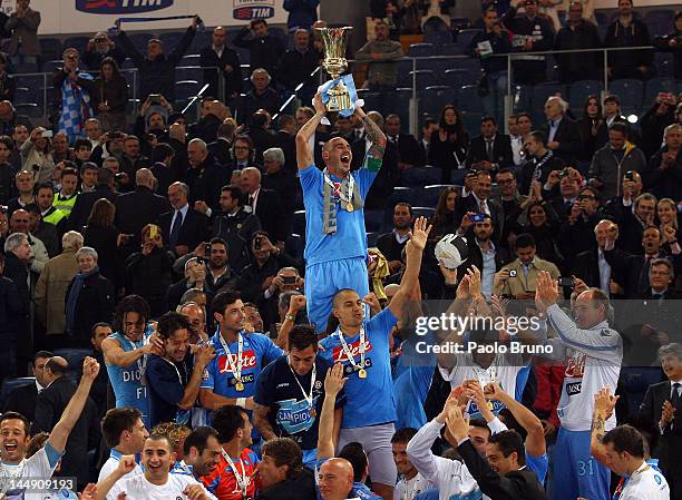 Paolo Cannavaro captain of SSC Napoli holds the trophy after winning the Tim Cup final match against Juventus FC at Olimpico Stadium on May 20, 2012...
