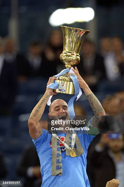 Paolo Cannavaro of SSC Napoli holds the Italian Tim Cup football trophy, during a ceremony after the Tim Cup Final between Juventus FC and SSC Napoli...