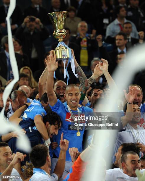 Paolo Cannavaro of Napoli celebrates victory after the Tim Cup final match between Juventus FC and SSC Napoli at Olimpico Stadium on May 20, 2012 in...