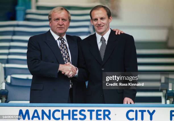 New Manchester City manager Steve Coppell pictured shaking hands with chairman Francis Lee at his unveiling on October 7th, 1996 at Maine Road,...