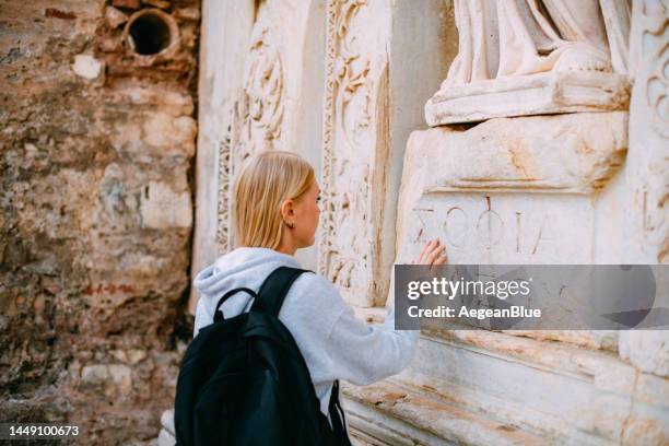 young woman exploring the ancient city - classical arch stock pictures, royalty-free photos & images