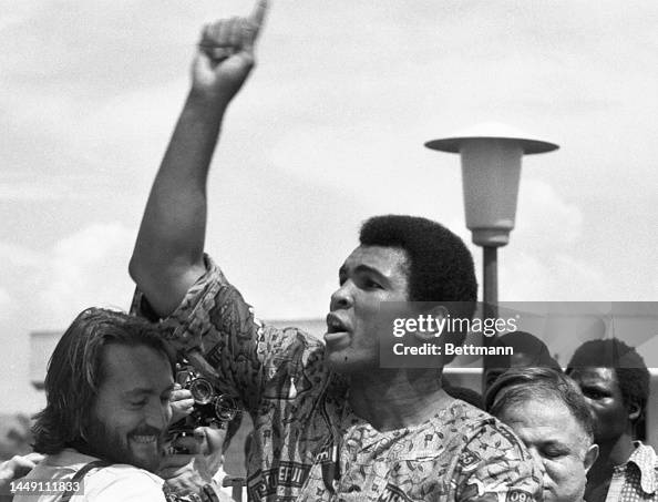 Muhammad Ali Rp Challenger Muhammad Ali reacts to a follower of George Foreman when ...