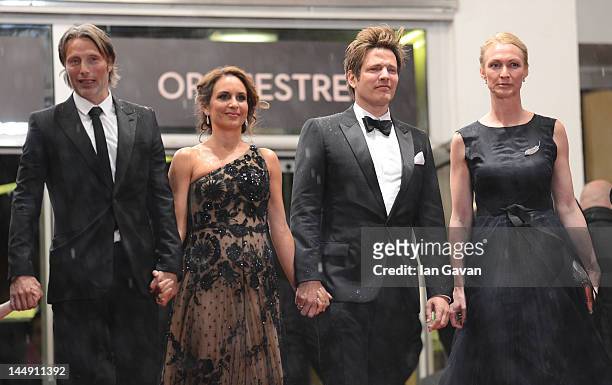 Sisse Graum Jorgensen, Director Thomas Vinterberg, Alexandra Rapaport and Mads Mikkelsen attend the "Jagten" Premiere during the 65th Annual Cannes...
