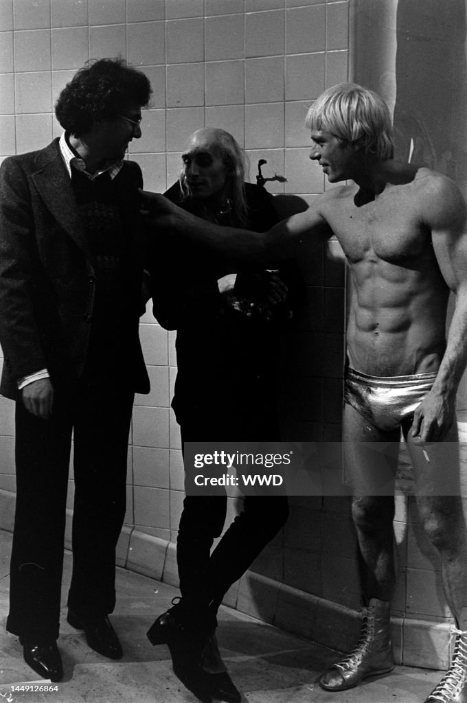 Michael White, Richard O'Brien, and Peter Hinwood prepare for filming