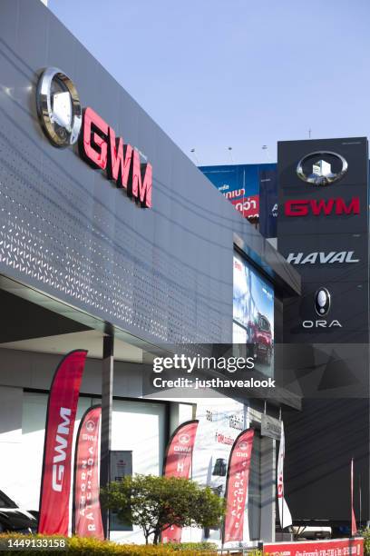 facade of new gwm electric vehicle garage store in bangkok - second hand car stock pictures, royalty-free photos & images