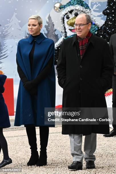 Princess Charlene of Monaco and Prince Albert II of Monaco attend the Christmas Tree at Monaco Palace on December 14, 2022 in Monaco, Monaco.