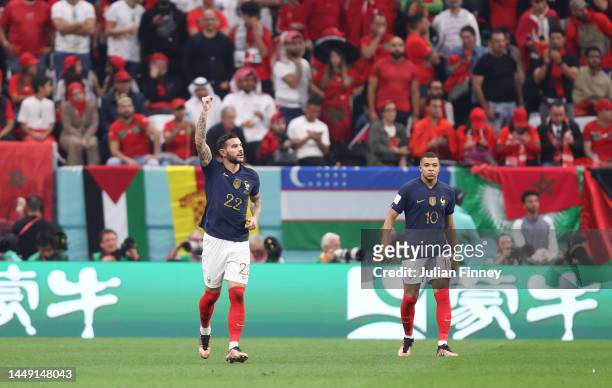 Theo Hernandez of France celebrates after scoring the team's first goal during the FIFA World Cup Qatar 2022 semi final match between France and...