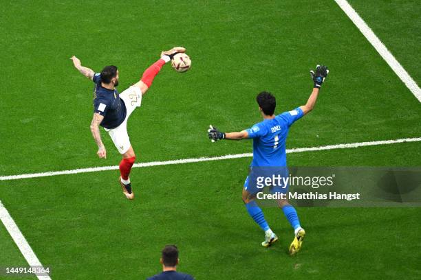 Theo Hernandez of France scores the team's first goal past Yassine Bounou of Morocco during the FIFA World Cup Qatar 2022 semi final match between...