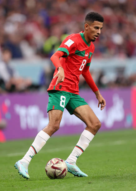 Azzedine Ounahi of Morocco runs with the ball during the FIFA World Cup Qatar 2022 semi final match between France and Morocco at Al Bayt Stadium on...