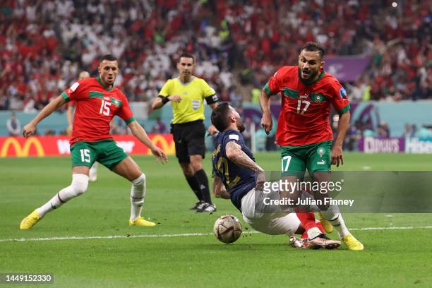 Theo Hernandez of France is fouled by Sofiane Boufal of Morocco during the FIFA World Cup Qatar 2022 semi final match between France and Morocco at...