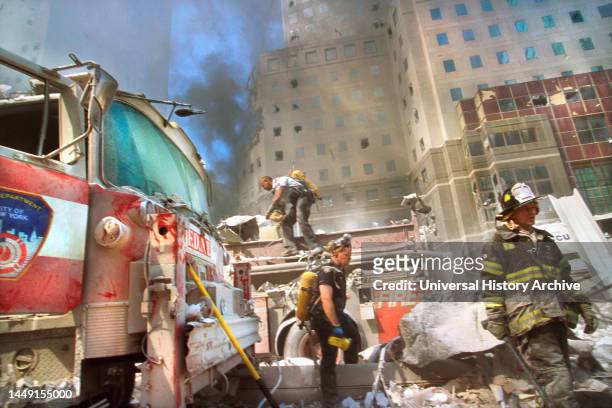 New York City fire fighters amid debris following September 11th terrorist attack on World Trade Center, New York City, New York, USA, Unidentified...