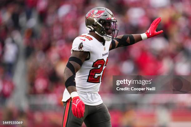 Keanu Neal of the Tampa Bay Buccaneers motions against the San Francisco 49ers at Levi's Stadium on December 11, 2022 in Santa Clara, California.