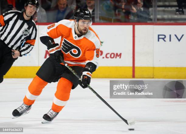 Ivan Provorov of the Philadelphia Flyers skates the puck against the Colorado Avalanche at the Wells Fargo Center on December 5, 2022 in...